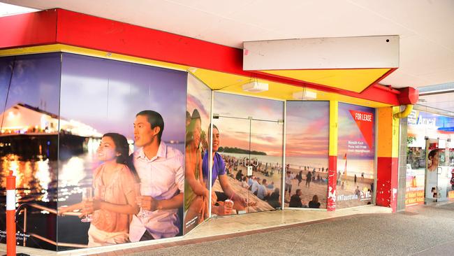 Tourism images in the window of a vacant Smith St Mall shop. Picture: Justin Kennedy