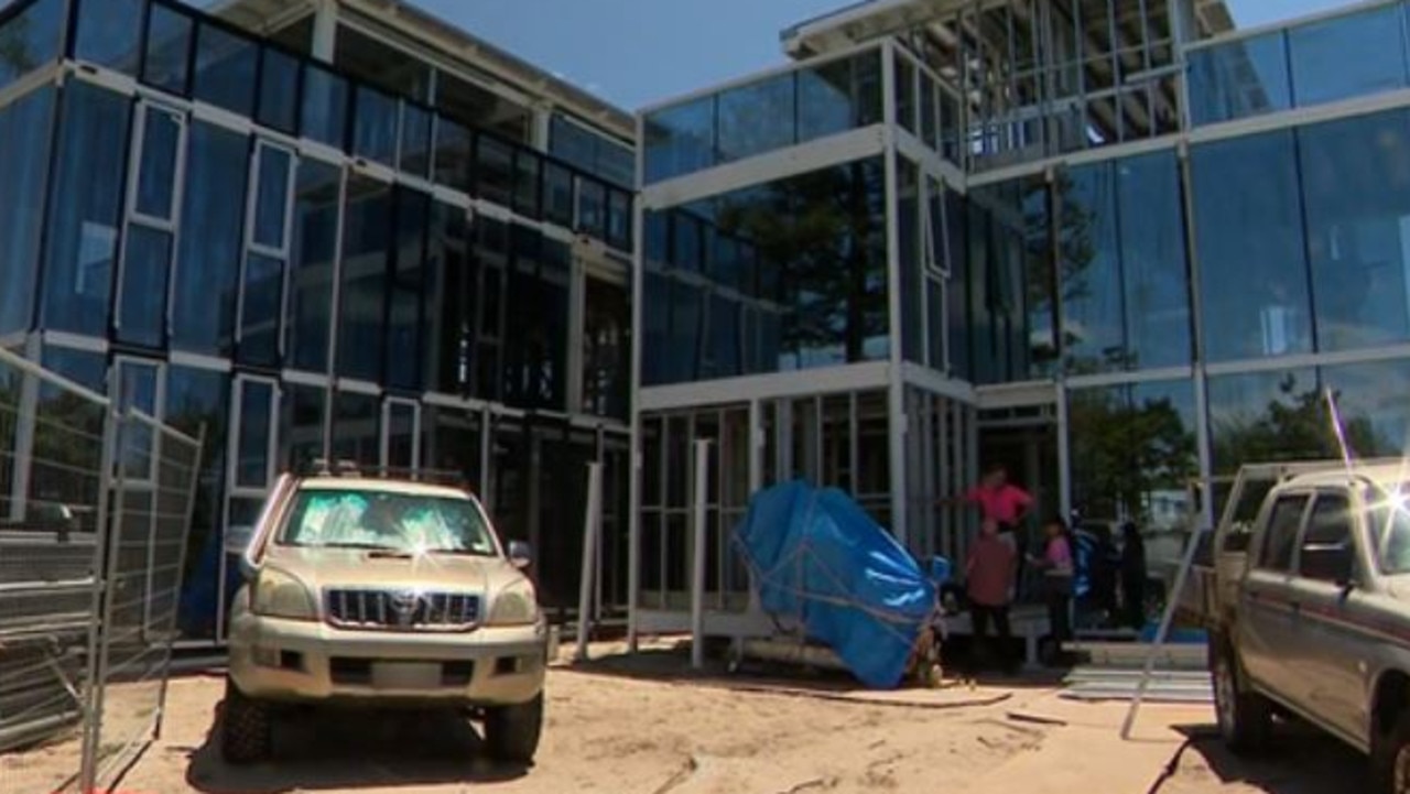 The three-storey home looks into the neighbours pool areas. Picture: ACA