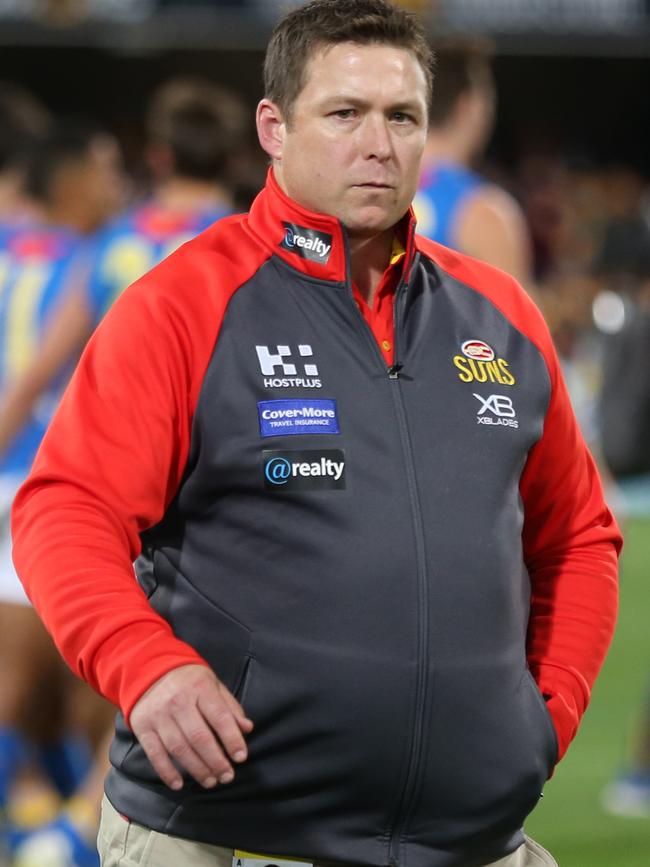 Greenwood says he has been in “constant contact” with Gold Coast coach Stuart Dew. Picture: Getty/Chris Hyde