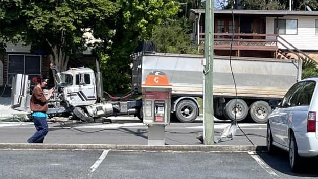 A truck has hit a power pole, causing power lines to fall on Beeville Road in Petrie. Picture: Isis Griffiths