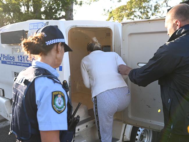 Griffiths is put in a police wagon. Picture: Jeremy Piper