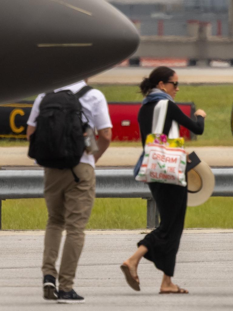 Prince Harry and Meghan Markle arriving in Atlanta on a private flight after a weekend in Grenada. Picture: Backgrid