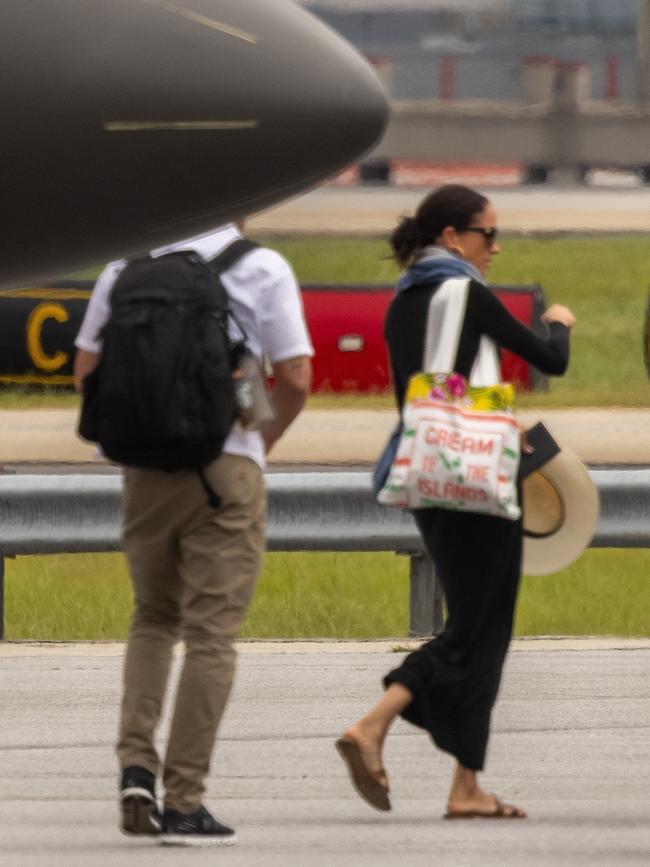 Prince Harry and Meghan Markle arriving in Atlanta on a private flight after a weekend in Grenada. Picture: Backgrid