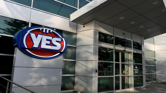 The “yes” sign replacing “AFL” on the league logo outside AFL House yesterday. Picture: AAP Image/Joe Castro