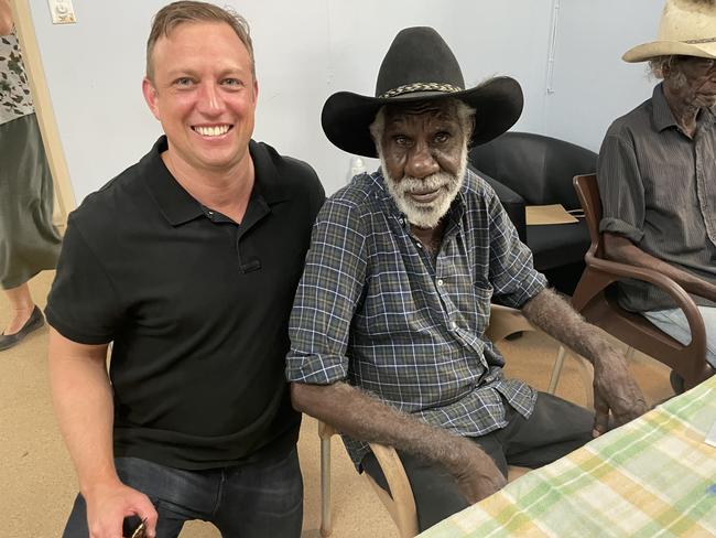 Deputy Premier Steven Miles meets former councillor Toby Barney while visiting Pormpuraaw to encourage locals to get vaccinated.