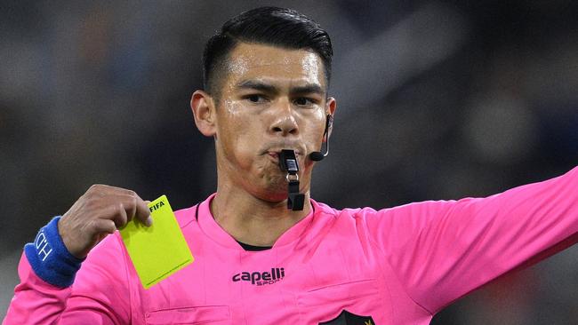SAN DIEGO, CALIFORNIA - MAY 17: Referee Victor Rivas issues a yellow card during the first half of the game between the San Diego FC and the Sporting Kansas City at Snapdragon Stadium on May 17, 2025 in San Diego, California. (Photo by Orlando Ramirez/Getty Images)