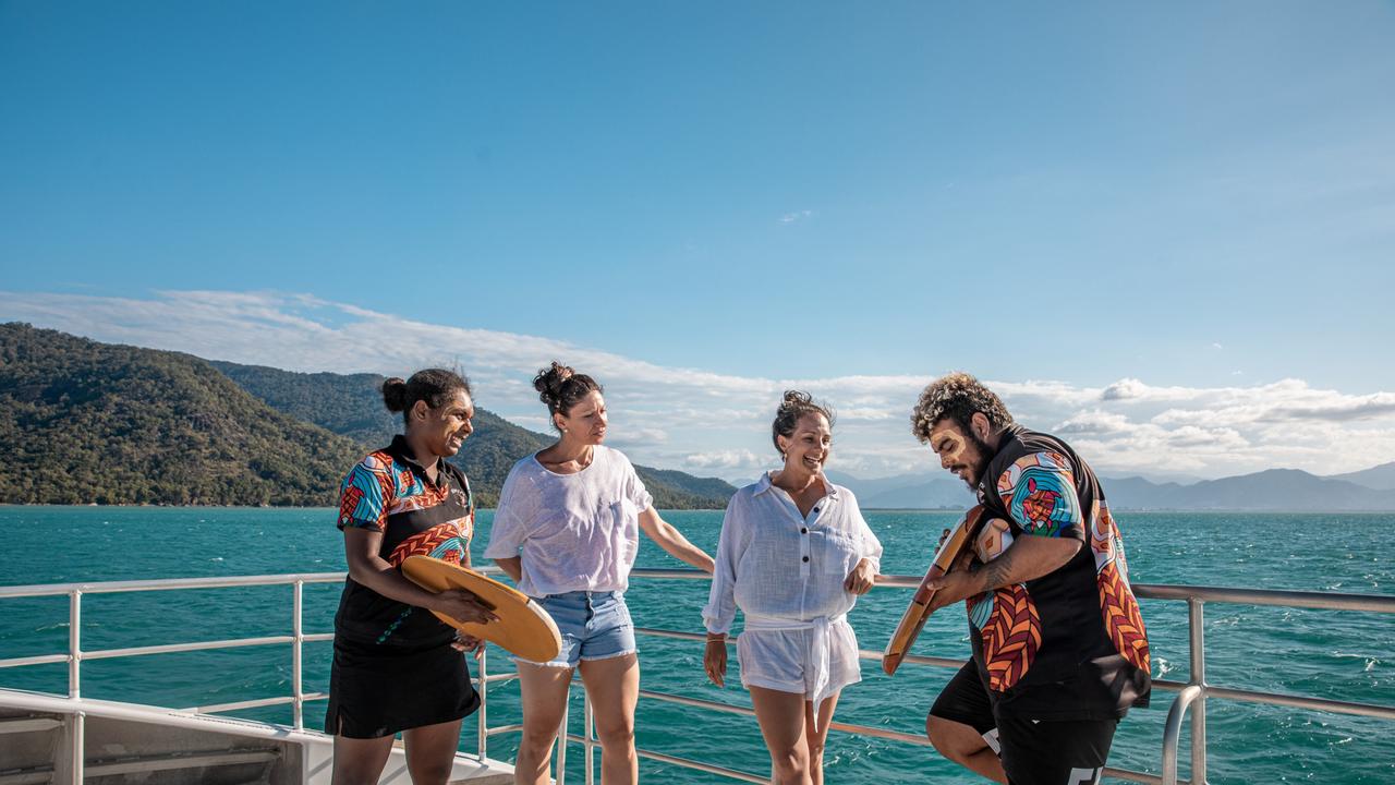 Tourists learn about Indigenous culture onboard a Dreamtime Dive and Snorkel boat. Picture: Supplied