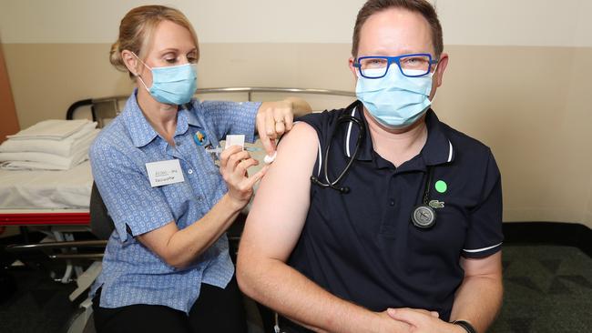 Dr Paul Griffin, an infectious disease expert, gets his own AstraZenecajab. Picture: Annette Dew