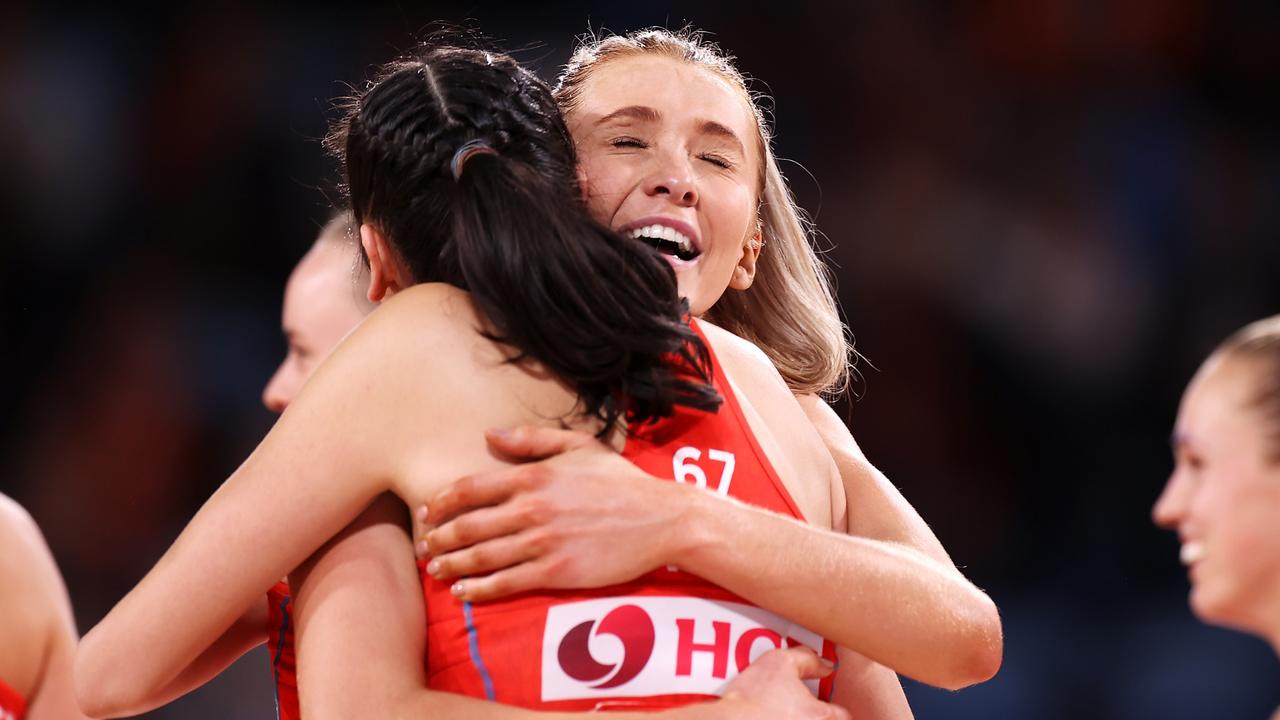 SYDNEY, AUSTRALIA - MAY 08: Helen Housby and Sophie Fawns of the Swifts celebrate victory during the round eight Super Netball match between GWS Giants and NSW Swifts at Ken Rosewall Arena, on May 08, 2022, in Sydney, Australia. (Photo by Mark Kolbe/Getty Images)