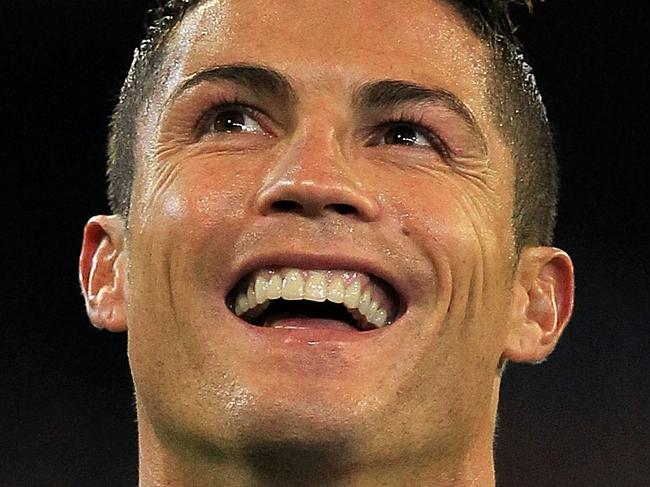 MELBOURNE, AUSTRALIA - JULY 24: Cristiano Ronaldo of Real Madrid smiles during the International Champions Cup match between Real Madrid and Manchester City at Melbourne Cricket Ground on July 24, 2015 in Melbourne, Australia. (Photo by Graham Denholm/Getty Images for International Champions Cup)