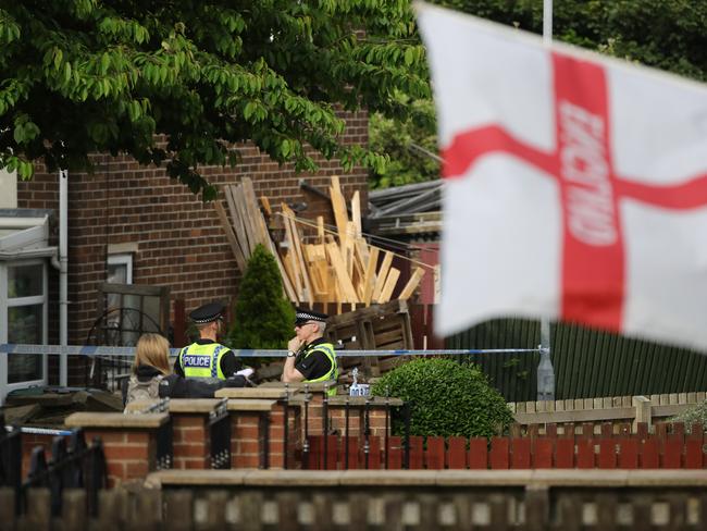 Police guard the scene at the suspect's home after Jo Cox, 41, Labour MP for Batley and Spen, was killed. Picture: Getty