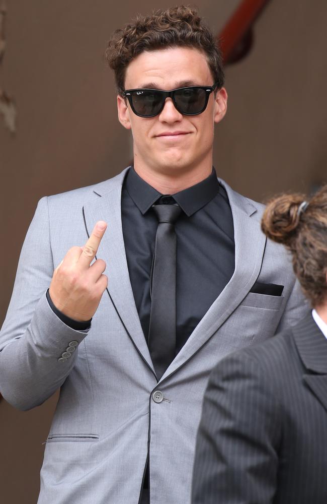 Zane Alchin flips the bird to photographers outside a Newtown court last year. Picture: John Grainger