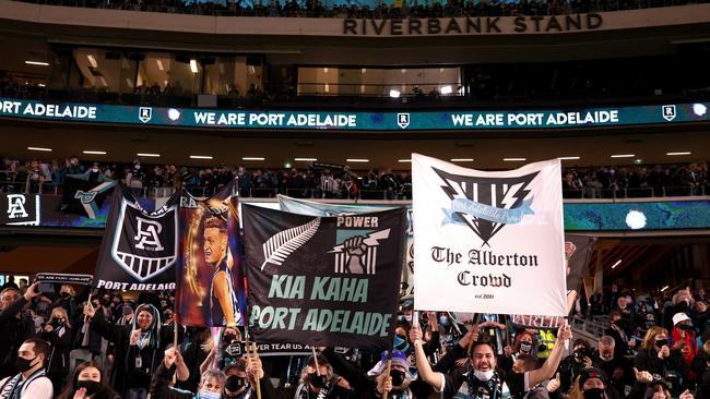 Port fans celebrate winning the AFL Second Qualifying Final at Adelaide Oval. Picture: Daniel Kalisz