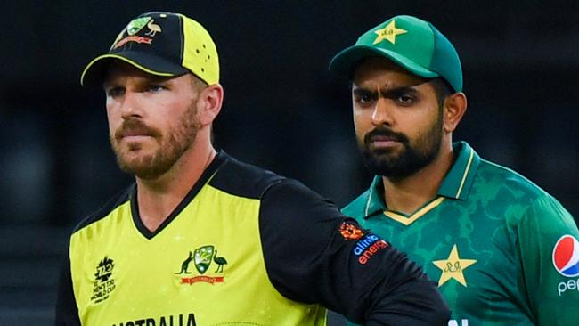 Australia's captain Aaron Finch won the toss but sent Pakistan's Babar Azam and his men into bat in their T20 semi-final match at the Dubai International Cricket Stadium in Dubai. Picture: AFP