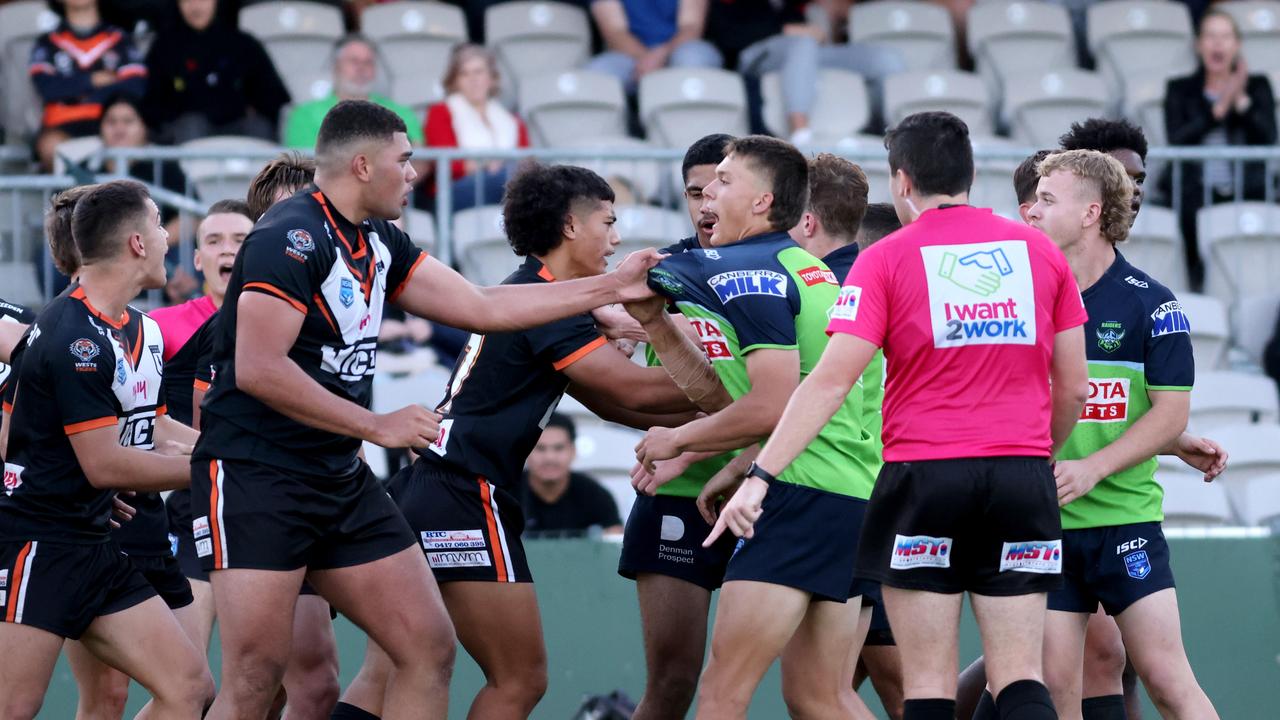 Players scuffle in the semi-final. Picture: Damian Shaw