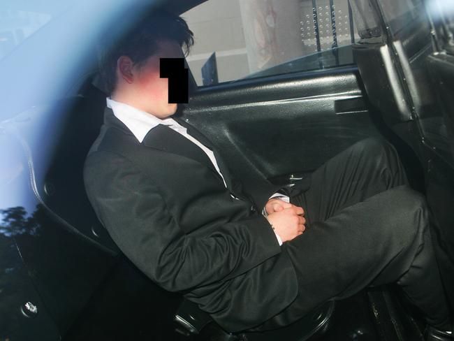 DL leaves the Supreme Court handcuffed in a Juvenile Justice vehicle in July 2005 after being found guilty. 