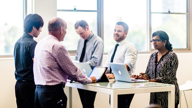 Team of teachers having a meeting.