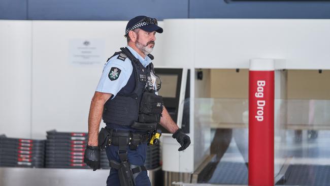 A police officer at Adelaide Airport. Picture: Matt Loxton