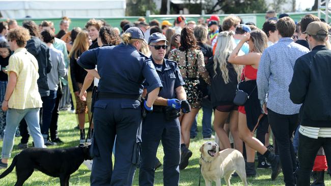 Police inspect patrons for illegal drugs entering the Listen Out Loud Festival at St Kilda. Picture: Andrew Henshaw