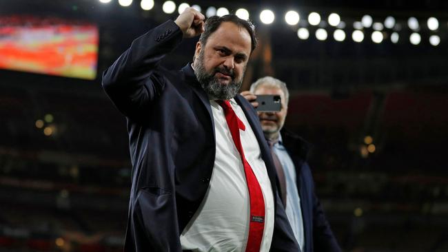 Olympiakos president Evangelos Marinakis celebrates on the pitch after the Europa league clash against Arsenal. He has since tested positive to the coronavirus Picture: AAP