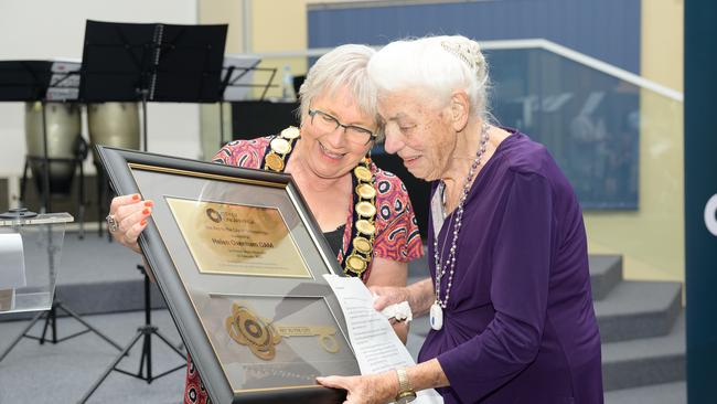 Onkaparinga Mayor Moira Were presents Helen Oxenham with the key to the city. Picture: Supplied