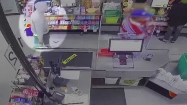 Footage shows man brandishing knife in supermarket