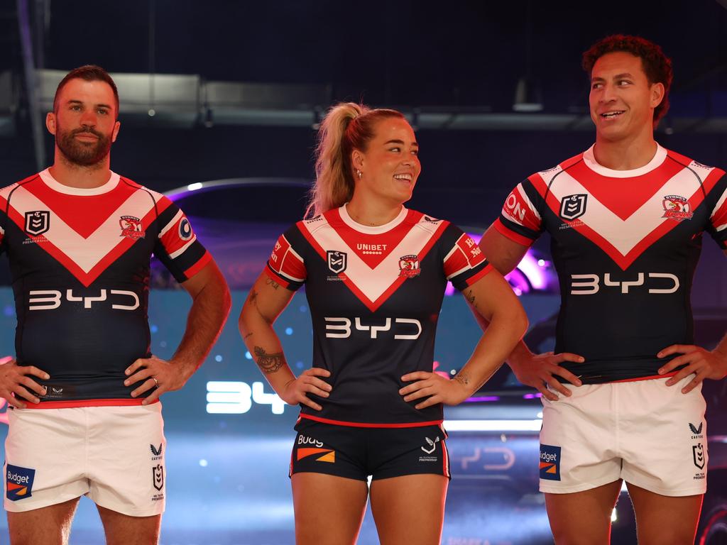 James Tedesco, Isabelle Kelly and Nawaqanitawase pose as the Sydney Roosters unveil their new sponsor, Chinese car company BYD. Picture: Rohan Kelly