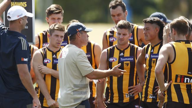 Alastair Clarkson speaks to his players during their clash with North Melbourne. Picture: Getty Images