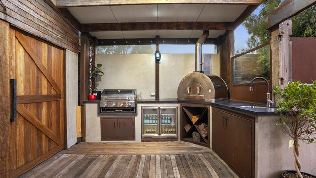 The outdoor kitchen.