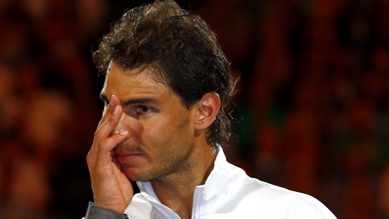 Australian Open Tennis Mens Singles Final 2014. Rafael Nadal vs Stanislas Wawrinka on Rod Laver Arena. Nadal wipes away tears at the presentation. Pic Michael Klein.