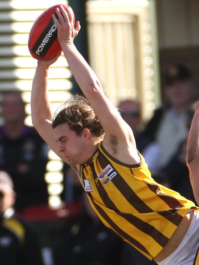 Lachlan McDonald flies for a mark. Picture: Stuart Milligan