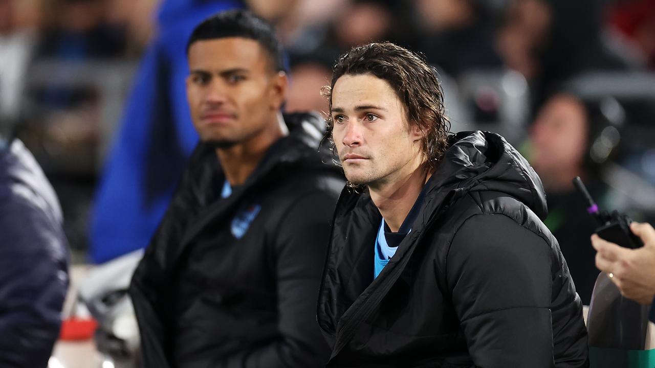 SYDNEY, AUSTRALIA - JUNE 08: Nicho Hynes of the Blues watches on from the sideline during game one of the 2022 State of Origin series between the New South Wales Blues and the Queensland Maroons at Accor Stadium on June 08, 2022, in Sydney, Australia. (Photo by Mark Kolbe/Getty Images)