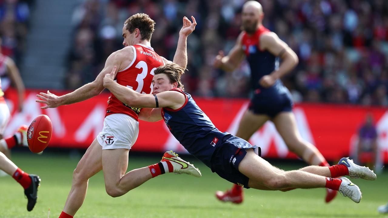 Tom Sparrow makes a diving tackle to stop Ben Paton. Picture: Michael Klein