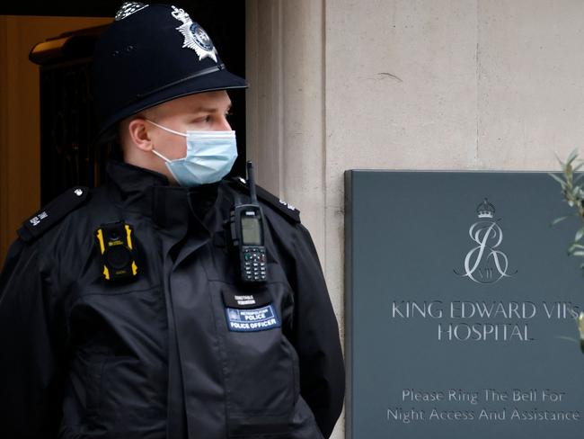 A policeman stands guard outside the private King Edward VII's Hospital where the Queen spent a night. Picture: AFP