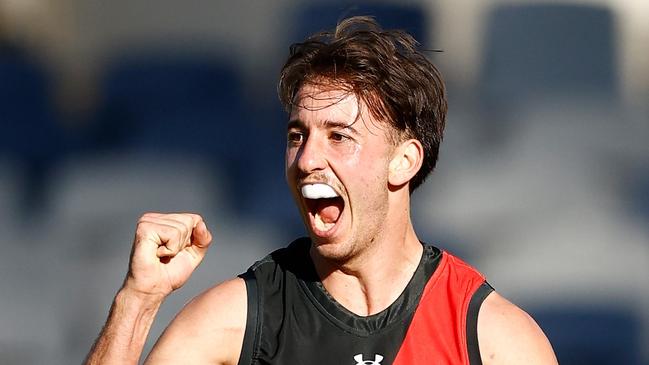 GEELONG, AUSTRALIA - MARCH 01: Nic Martin of the Bombers celebrates during the 2024 AFL AAMI Community Series match between the Geelong Cats and Essendon Bombers at GMHBA Stadium on March 01, 2024 in Geelong, Australia. (Photo by Michael Willson/AFL Photos via Getty Images)