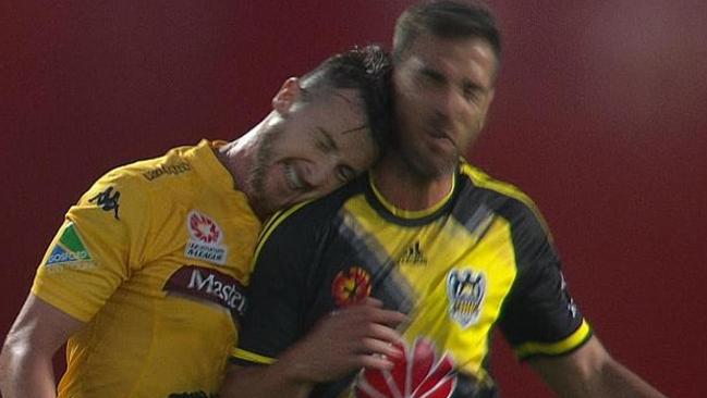 Central Coast's Roy O'Donovan headbutts Wellington's Emmanuel Muscat.