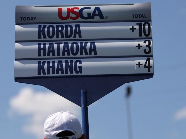 LANCASTER, PENNSYLVANIA - MAY 30: A detailed view of a volunteerâs scoreboard displaying scores of Nelly Korda of the United States, Nasa Hataoka of Japan and Megan Khang of the United States during the first round of the U.S. Women's Open Presented by Ally at Lancaster Country Club on May 30, 2024 in Lancaster, Pennsylvania.   Patrick Smith/Getty Images/AFP (Photo by Patrick Smith / GETTY IMAGES NORTH AMERICA / Getty Images via AFP)