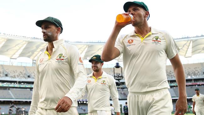 Nathan Lyonand Josh Hazlewood leave the field at the end of play during day four. Picture: Getty Images