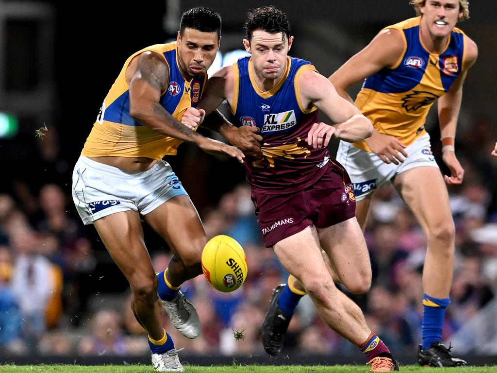 Tim Kelly and Lachie Neale go head to head for the ball in Brisbane v West Coast. Picture: Bradley Kanaris/Getty Images