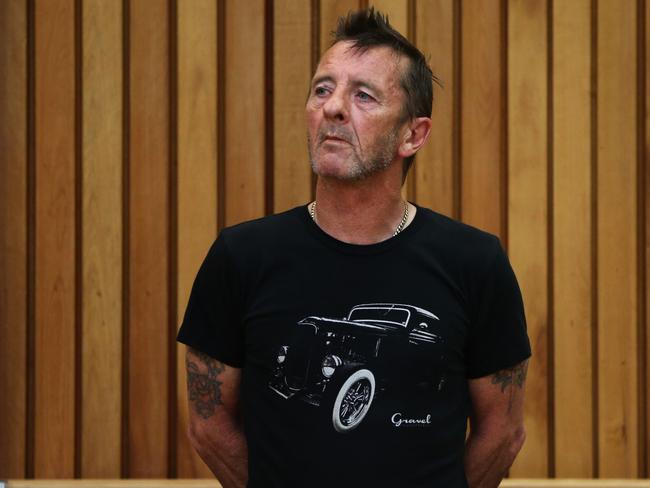 Crisis ... AC/DC drummer Phil Rudd appears in court after being charged with threatening to kill and possession of meth and marijuana. Picture: Joel Ford/Getty Images
