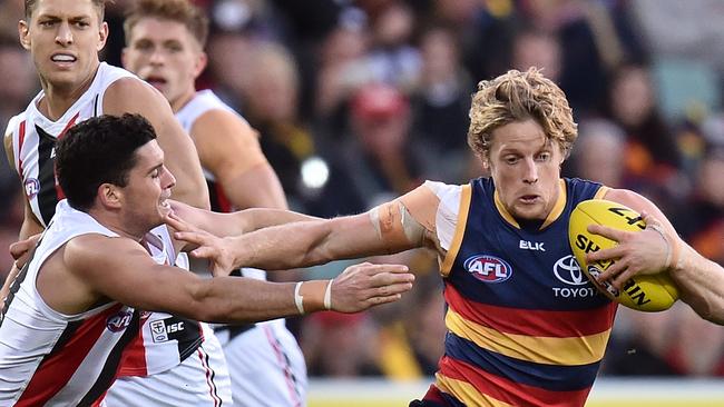 ARory Sloane of the Crows evades a tackle from St Kilda’s Leigh Montagna. Sloane has been in stellar form this season. Picture: Daniel Kalisz (Getty Images)