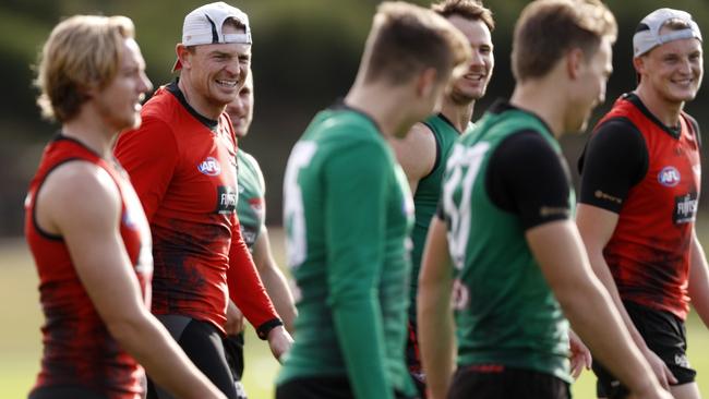 Brendon Goddard shares a laugh at Essendon training.