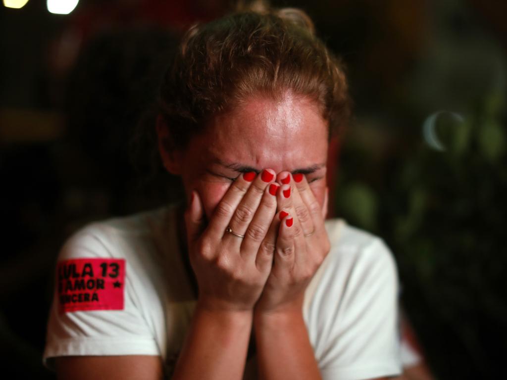 A supporter of Luiz Inácio ‘Lula’ da Silva breaks into tears as vote count reaches 90 per cent. Picture: Joao Laet/Getty Images