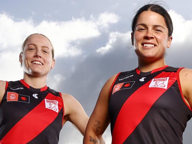 MELBOURNE, AUSTRALIA - September 5, 2023. AFLW .   Essendon AFLW players Madi Prespakis, Steph Cain (left) and bonnie Toogood at Windy Hill before their game on Sunday.  Photo by Michael Klein.