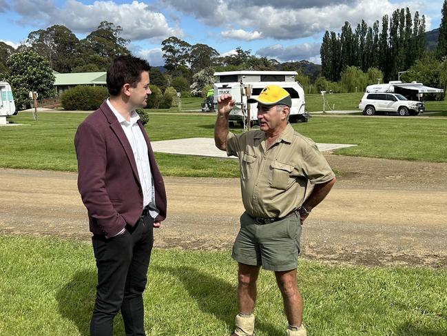 Labor Leader Dean Winter discusses the impact of further delays to the new Spirits on businesses across the state with Rowan Carter, owner/operator of Huon Valley Caravan Park.