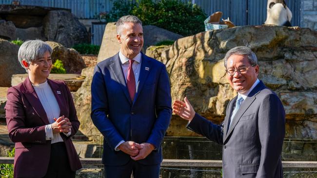 Foreign Minister Penny Wong, SA Premier Peter Malinauskas and Chinese Premier Li Qiang in front of the panda enclosure at Adelaide Zoo. Picture: Asanka Ratnayake/Getty Images