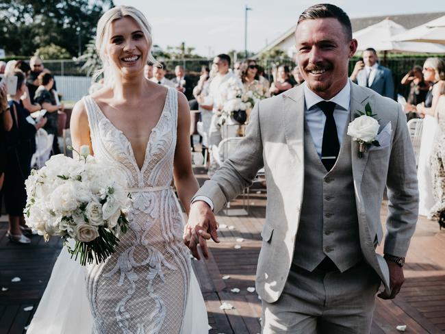 SUNDAY TELEGRAPH SPECIAL. State of Origin star Damien Cook & his partner Courtney Blaine celebrate their wedding. Picture supplied MUST CREDIT JASON CORROTTO PHOTOGRAPHY