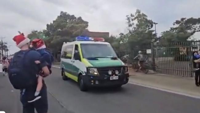 An out-of-control car has caused a major scare at the Port Adelaide Christmas Pageant, with participants being treated for shock after almost being hit. Picture: NINE NEWS