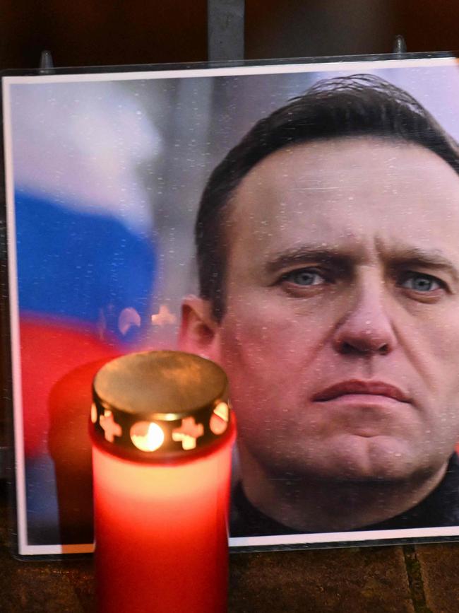 Candles and a photo of Russian opposition leader Alexei Navalny.