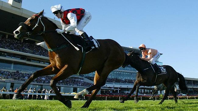 Jockey Jay Ford leads Takeover Target to a maiden Group 1 win in the 2004 Salinger Stakes at Flemington.